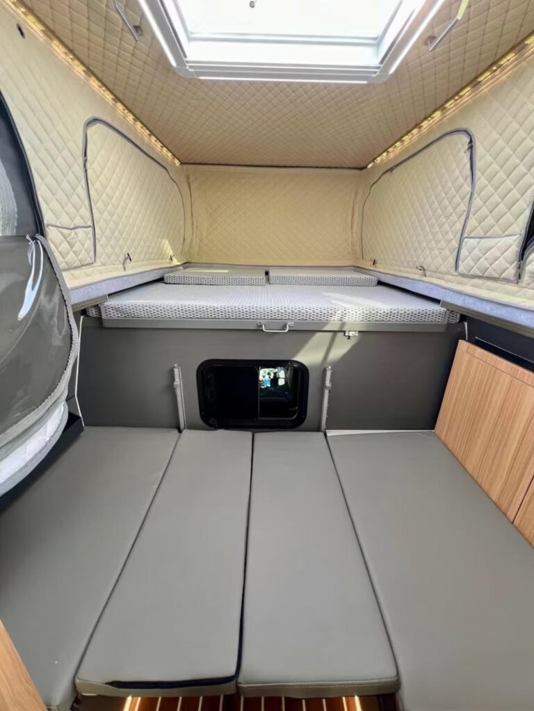 Grizzly Pod camper interior with mattresses shown.